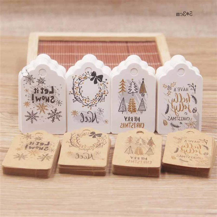 

100pcs 5*3cm Merry Christmas Tags Kraft Paper Card Gift Label Tag Diy Hang Tags Gift Wrapping Decor Gift Card Wholesale