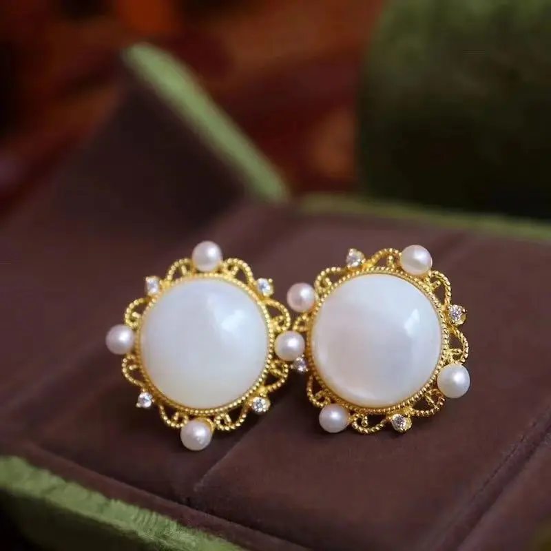 

Женские серебряные серьги, инкрустированные жемчугом