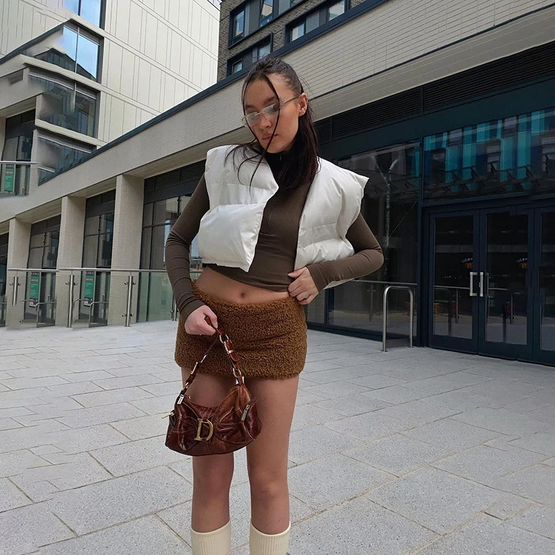 European American style 2021 autumn and winter new women's round neck sleeveless solid color cardigan slim short quilted vest
European American style 2021 autumn and winter new women's round neck sleeveless solid color cardigan slim short quilted vest
