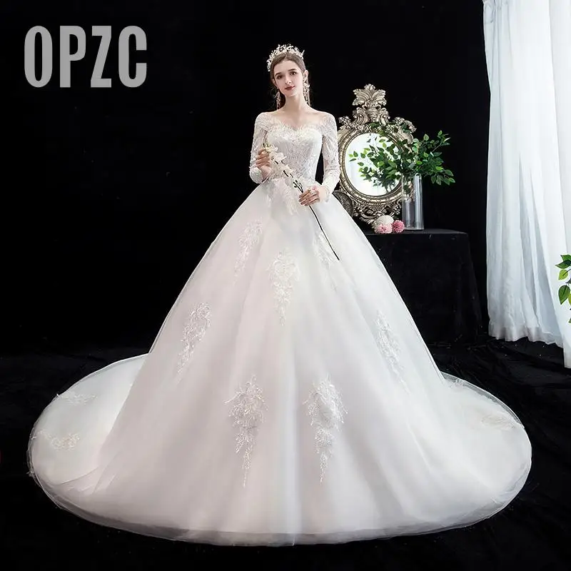 Свадебное платье с v образным вырезом и открытой спиной длинным рукавом шлейфом