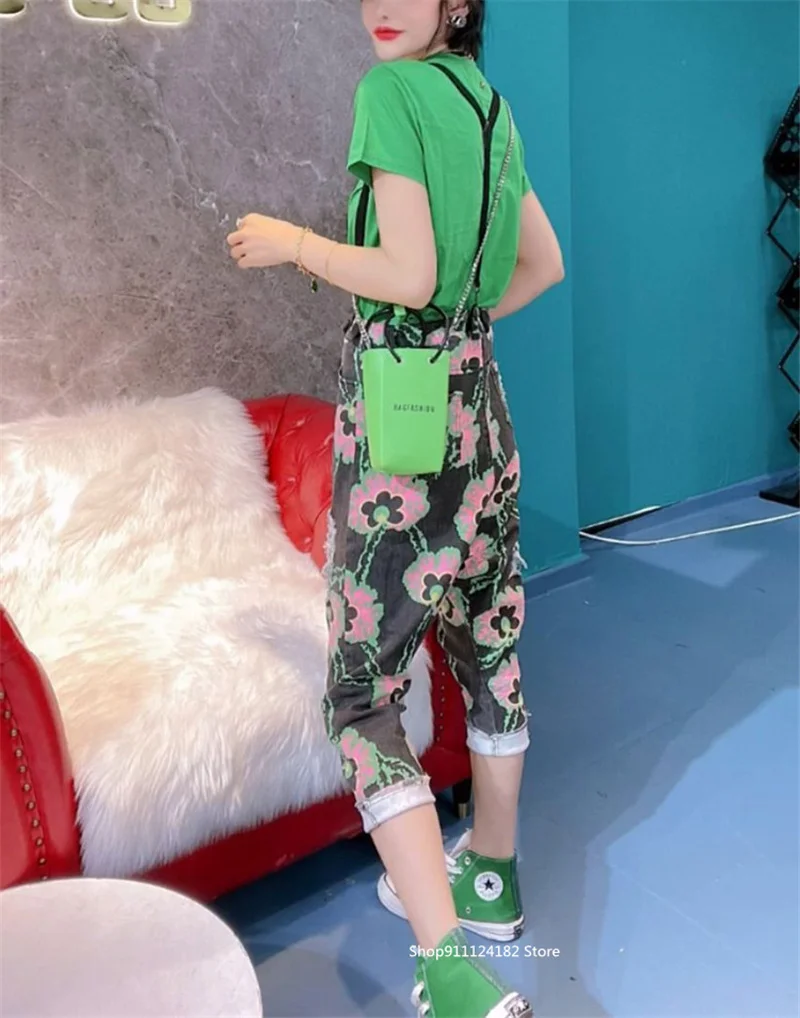 European Goods Tide Brand Design Sense Flower Pattern Hole Cropped Feet Harem Pants Female 2021 Summer High Waist Slim Overalls
