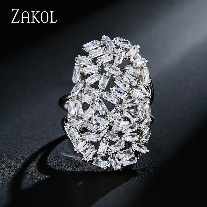 Женское кольцо ZAKOL белое овального цвета с кубическим цирконием AAA вечерние