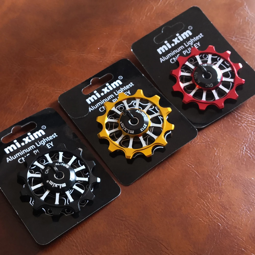 

2021New 12T MTB Bicycle Rear Derailleur Jockey Wheel Ceramic bearing Pulley AL7075 CNC Road Bike Guide Roller Idler 4mm5mm6mm