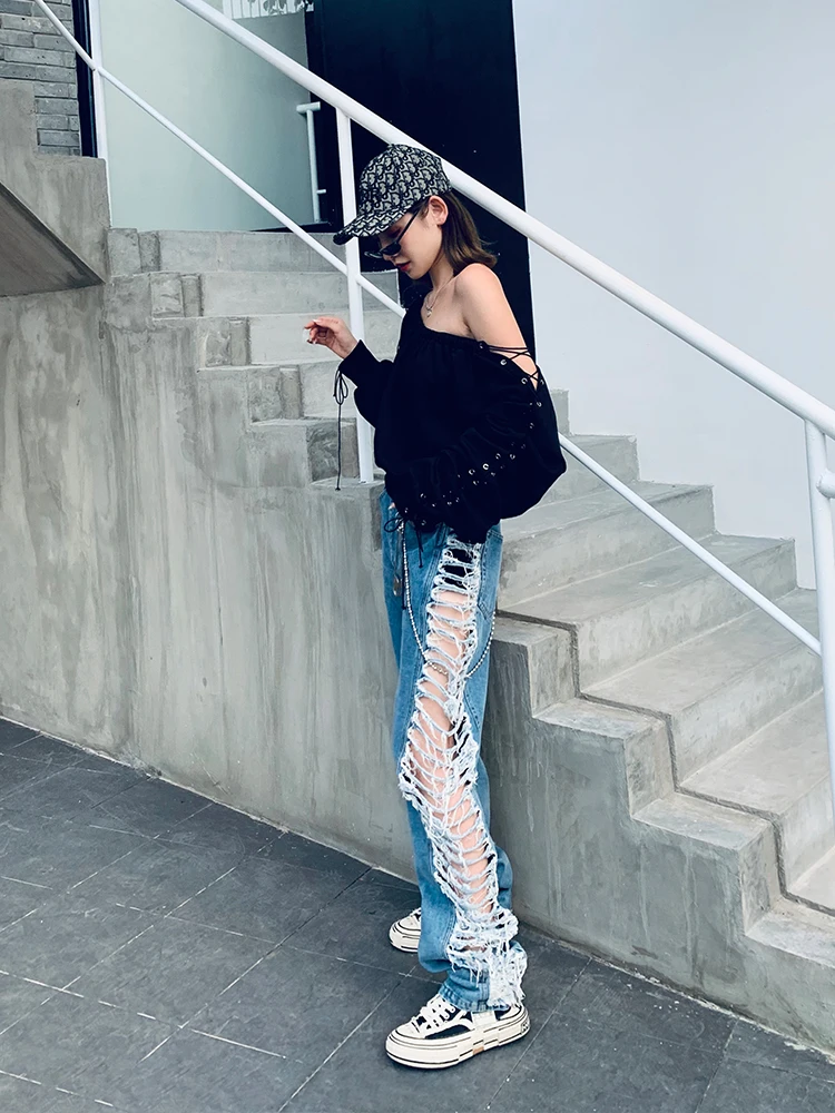 Модные брендовые женские джинсы с боковыми дырками на весну 2020 свободные