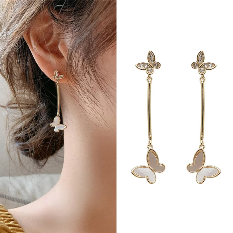 Серьги гвоздики с кристаллами в виде бабочек серебро 925 пробы циркониевая серьга