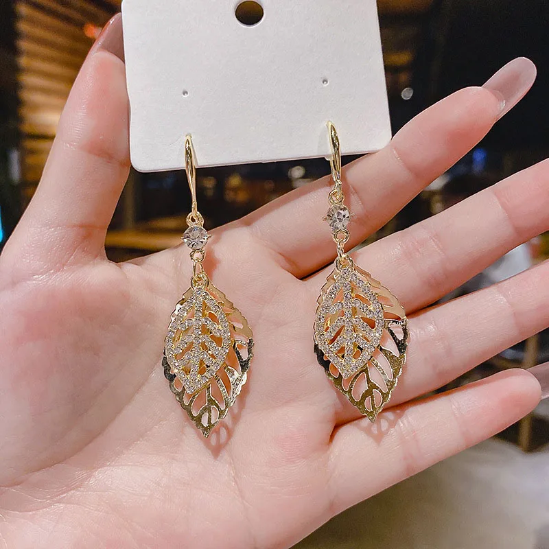 

Gold Color Crystal Leaf Earrings for Women Hollow Leaf Charm Drop Earings Women's Fashion Dangle Earrings Korean Jewelry New