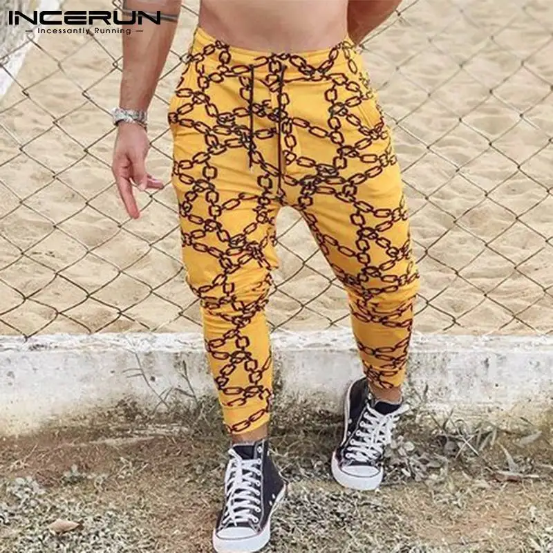 

Стильные Новые мужские брюки с рисунком цепей, женская уличная одежда, хорошо облегающие длинные брюки, брюки с цепочкой и шнурком, модель ...