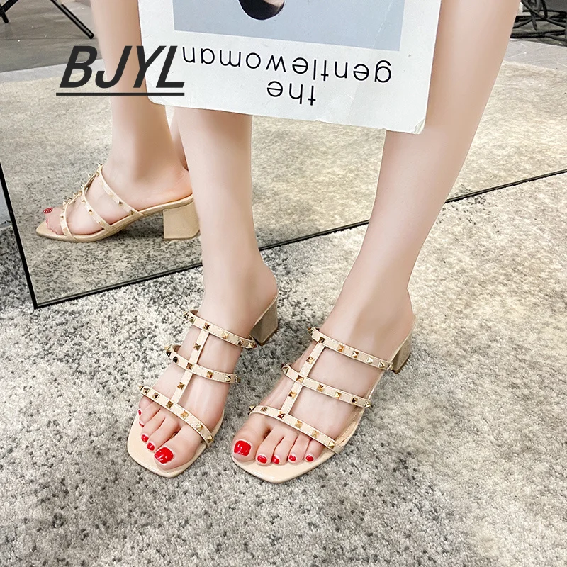 

High-heeled sandals women 2021 new summer girls mid-heeled thick heels with skirt rivets outer wear sandals and slippers women