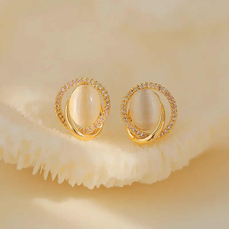 

Dainty Female Oval Moonstone Small Earring Classic Gold Color Love Wedding Earrings For Women Charm Hollow Crystal Stud Earrings