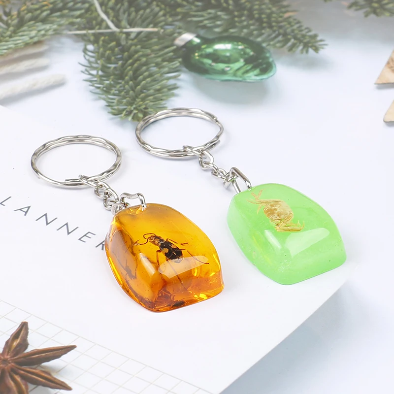 Брелок из искусственного янтаря подвеска в виде капли воды с плоским дном для