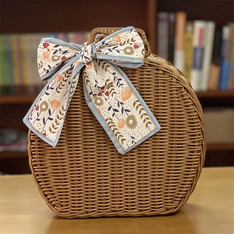 

New creative pastoral style round rattan storage hi tea moon cake box gift packaging with souvenirs retro woven rattan suitcase
