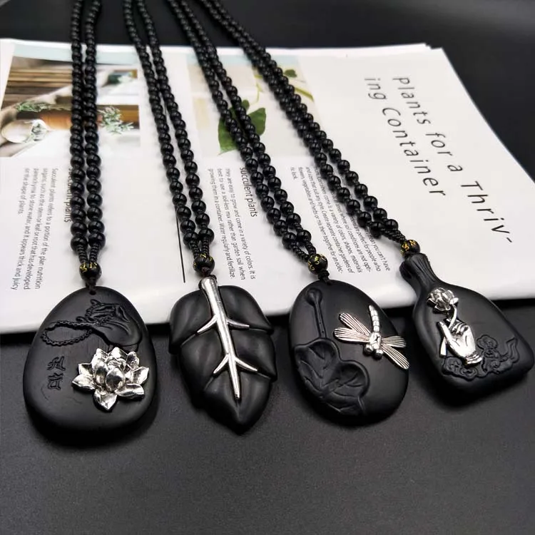 

Direct selling Obsidian alloy men and women's ancient silver necklace personality retro animal and plant pendants