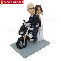 couple bride groom riding on a motorcycle wedding ceremony cake toppers stands figurines handmade clay dolls