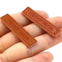 50pcs rectangle handmade letter pattern pu leather tags embossed label diy brown flag labels for garment sewing accessory