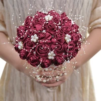 popular bride and bridesmaid holding bouquets pearl beading wine red satin roses handmade wedding supplies