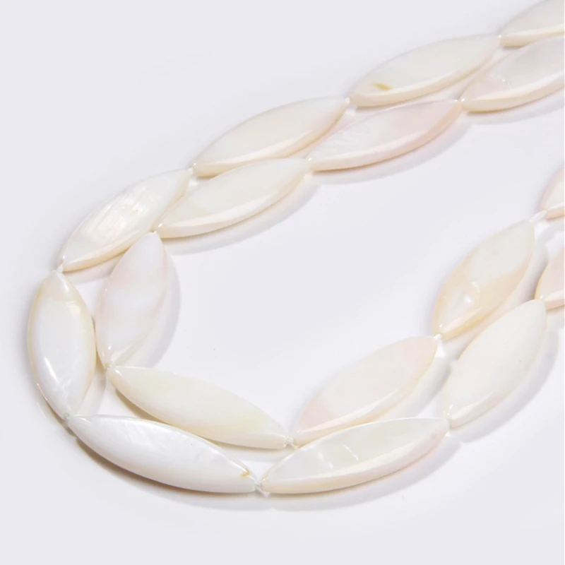 Оптовая продажа белые длинные овальные бусины в виде ракушек натуральные