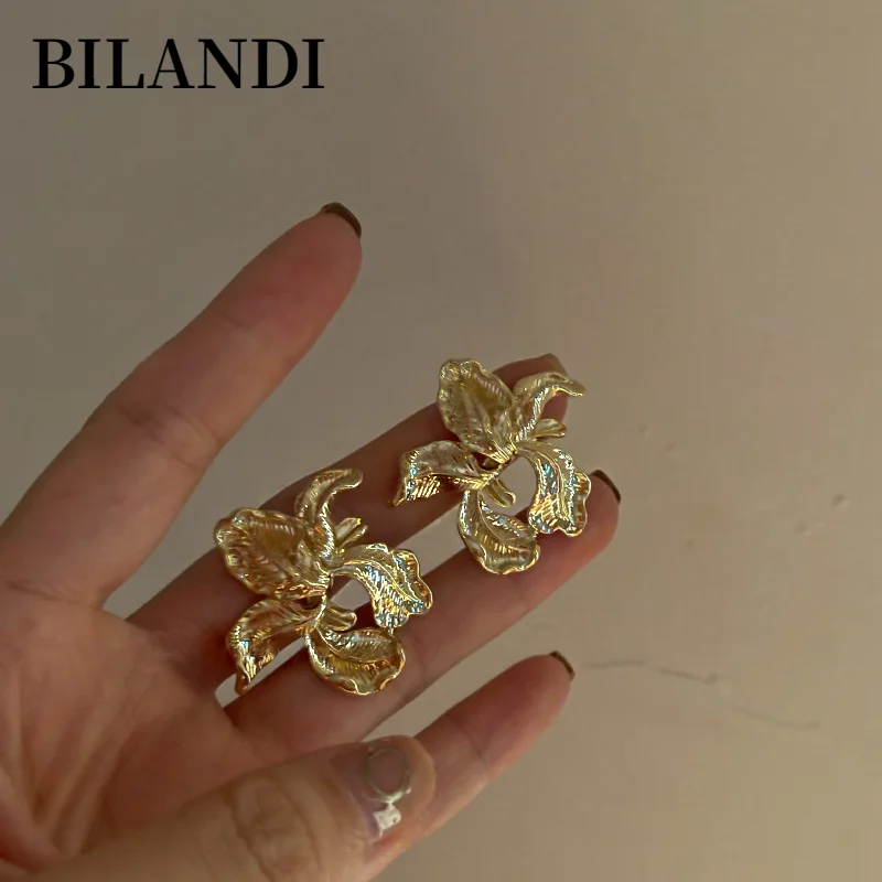 

Bilandi S925 needle Shiny Flower Earrings 2021 New Trend Popular Style Metal Alloy Golden Color Women Earrings For Party Gifts