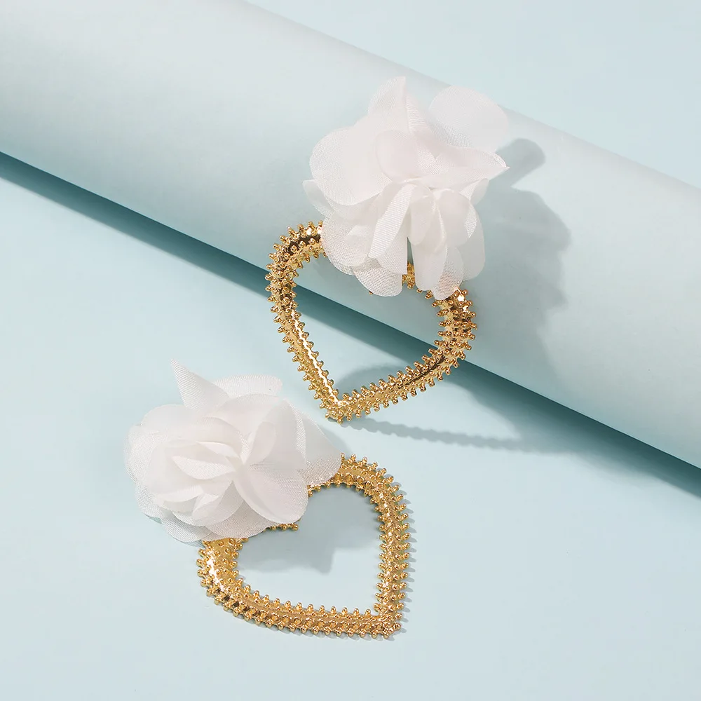 

In 2021 Bohemia Trend Alloy Flower Metal Earrings Yarn Material Exaggerated Fashion Pearl Women Irregular Stud Earrings