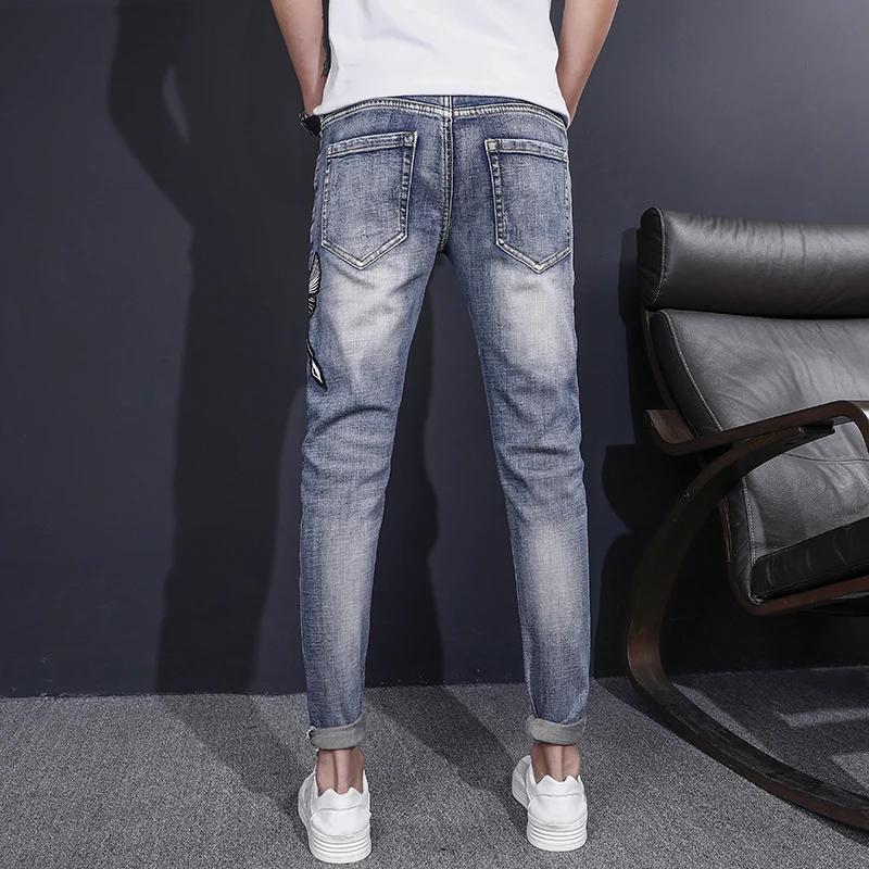 Весенние и осенние мужские джинсы с принтом в европейском американском стиле