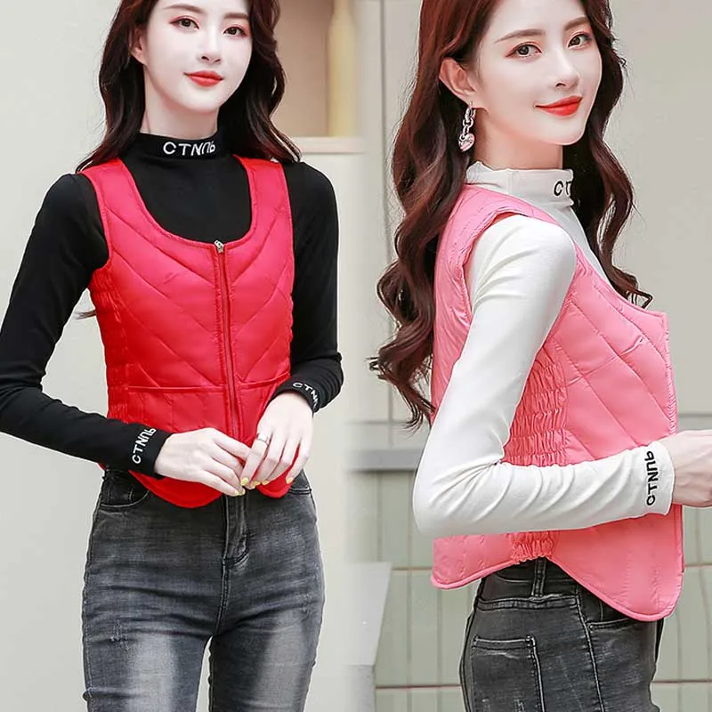 Женский жилет на 80% утином пуху зимний молнии без рукавов теплая однотонная