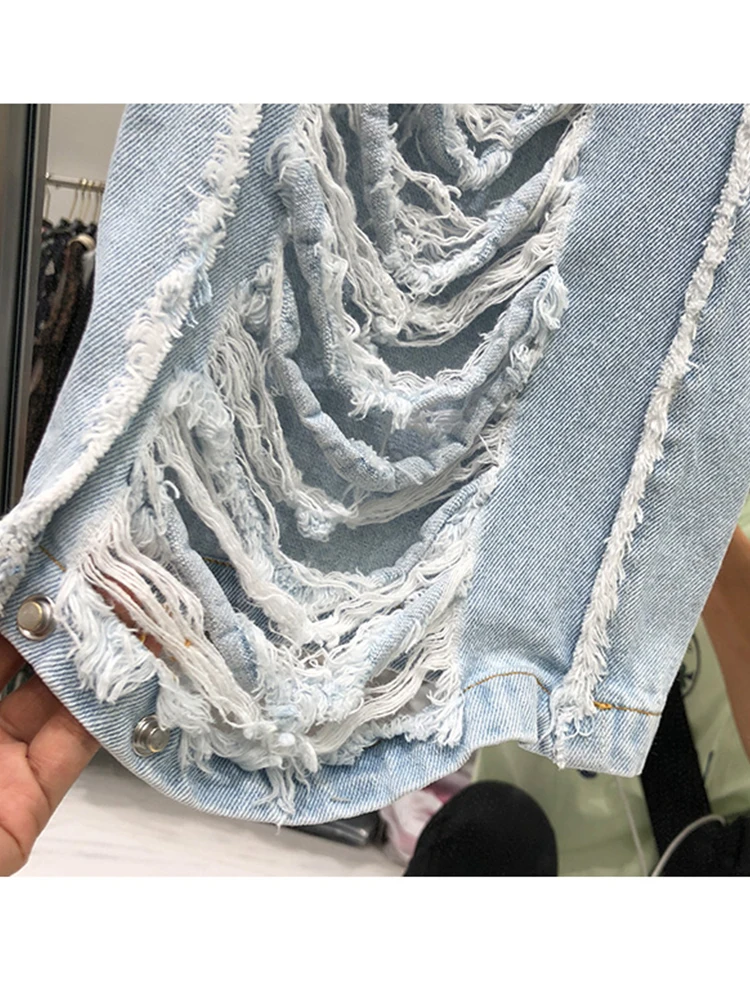

Free shipping heavy crafts, old, washed water, worn holes, high waist, metal buttons, loose jeans, women's autumn new styles