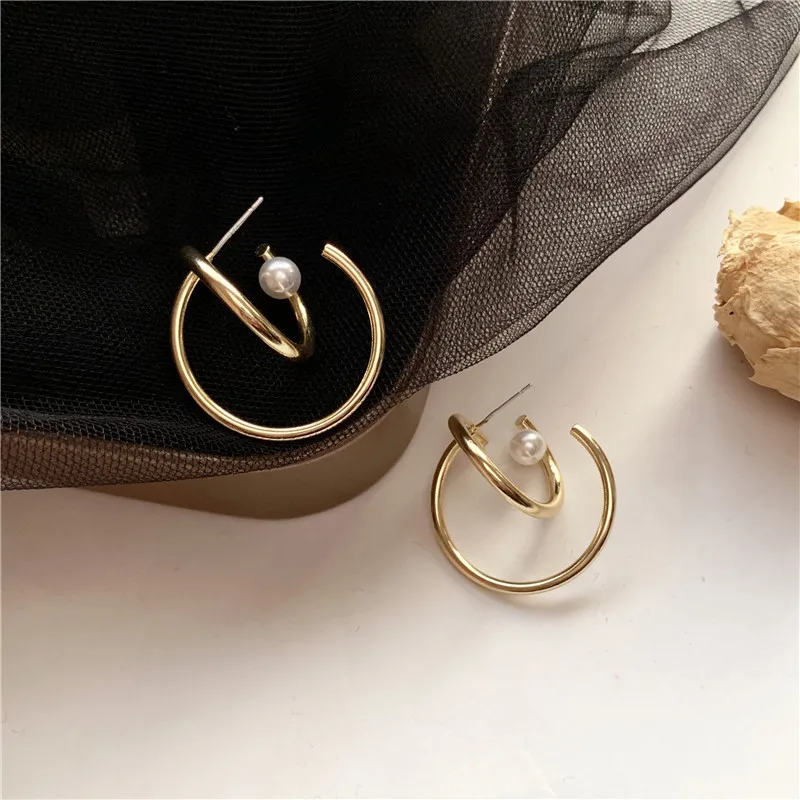 

Fashion ins wind ear contracted temperament metal winding circle stud earrings