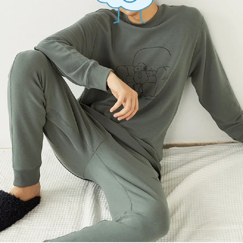The new couple long-sleeved trousers pajama suit, comfortable and soft male long-sleeved home wear suit, round neck print.