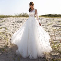 a line tulle long sleeve wedding dresses 2021 sheer o neck lace appliques sweep train boho beach bridal gown with open back