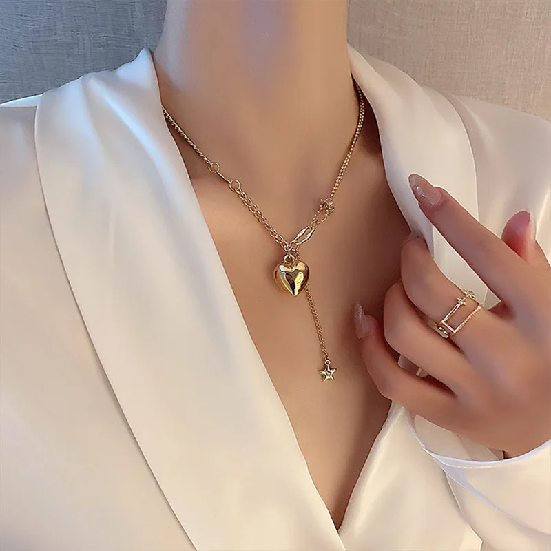 

Necklace metal material 2021 new temperament joker sweater chain love pendant temperament female collarbone chain