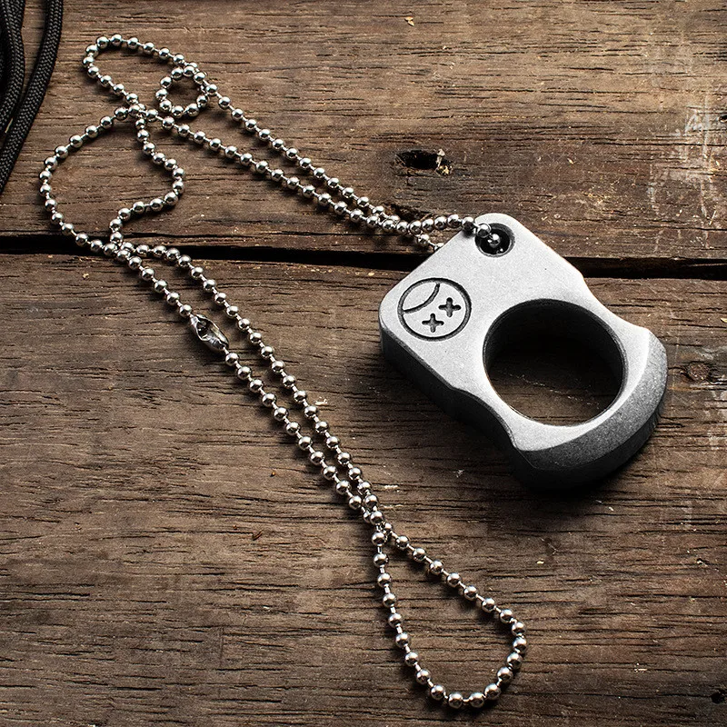 

Alloy steel outdoor EDC tactical tool. Multifunctional men's necklace pendant, key ring pendant, emergency window breaker