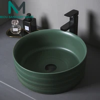 ceramic sink wash basin ceramic counter top green wash basin bathroom sinks round with drainage tap