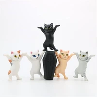 2021 hot selling style charming coquettish ornaments cat pen holder black cat carrying coffin stand cute ornaments
