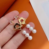 wholesale price 6 7mm plum blossom buckle white natural freshwater australia south sea pearl earring
