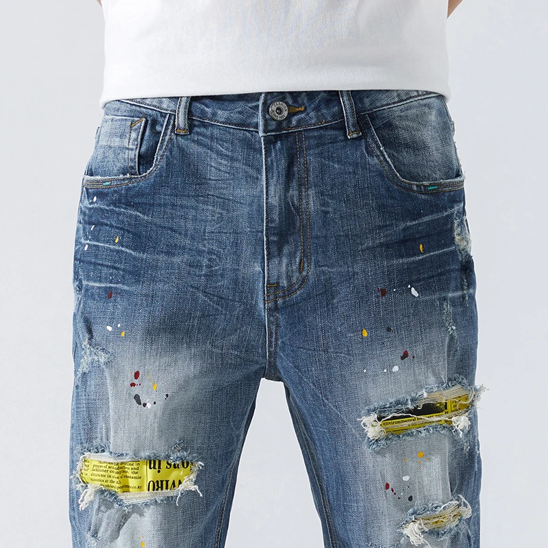 Рваные джинсы мужские облегающие синие Стрейчевые весенние состаренные в стиле