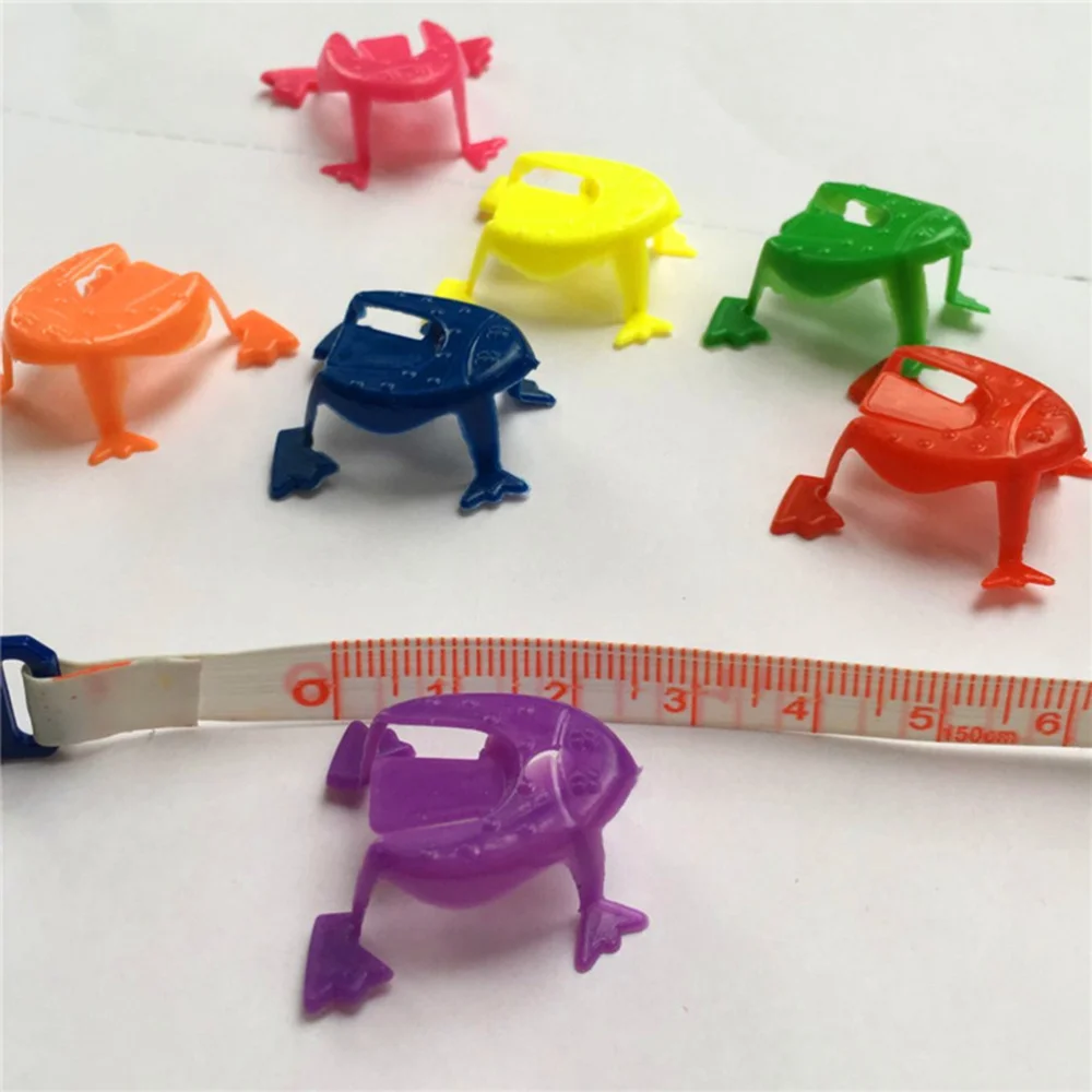 

100 Pcs Mini Jumping Finger Pressing Jumping Toys for Kids Great Party Favors Girl Boy Birthday Gifts (Random Color and Style)