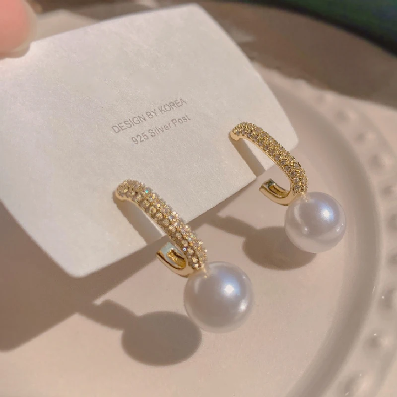 

French retro pearl tassel long earrings minority design personality high sense light luxury Earrings goddess Earrings Jewelry