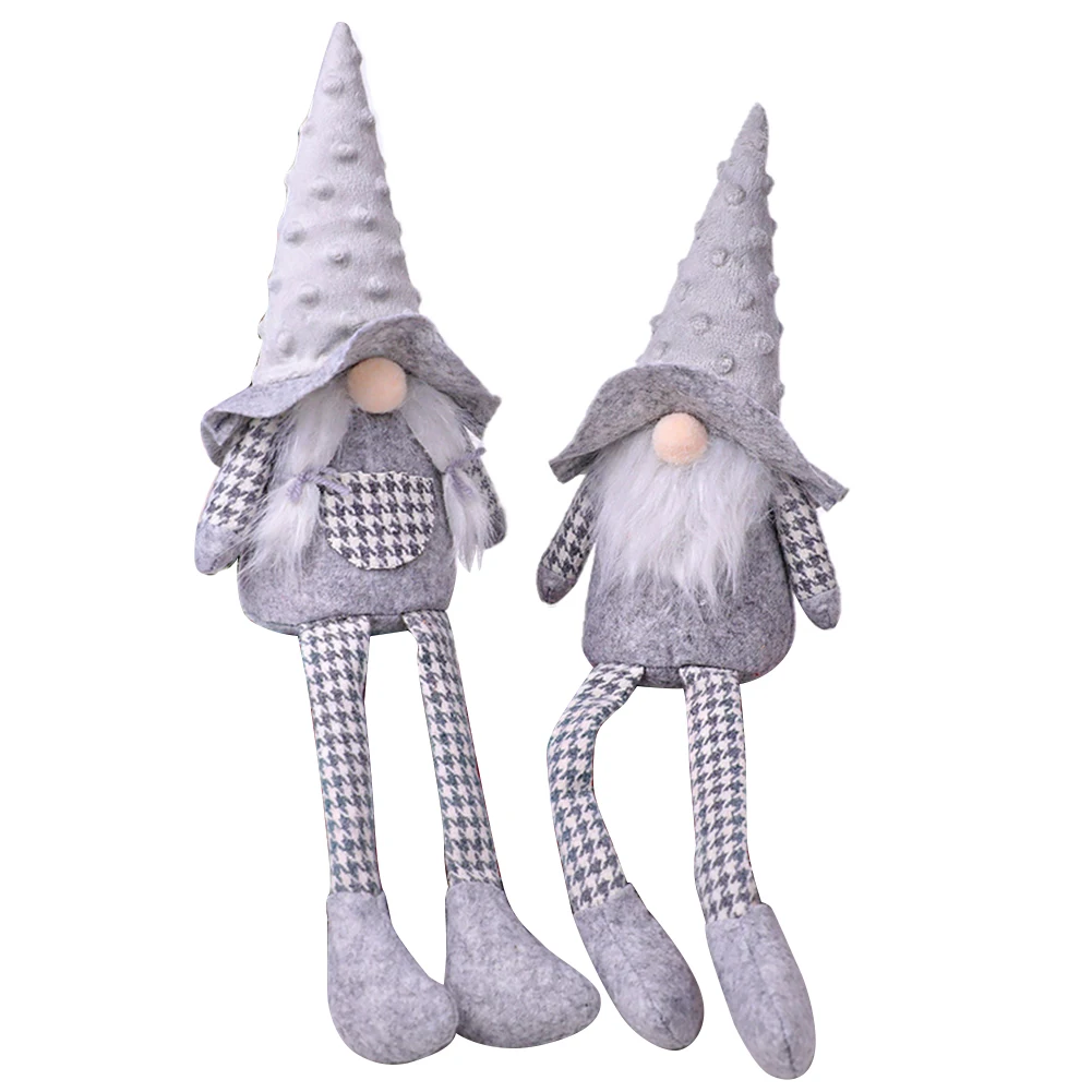 Рождественская кукла с длинными ногами сидящая без лица Рождественские