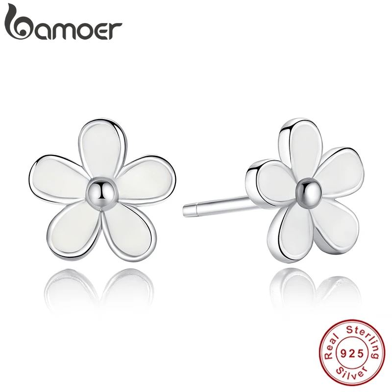 Женские серебряные серьги гвоздики белая эмаль с прозрачным кубическим