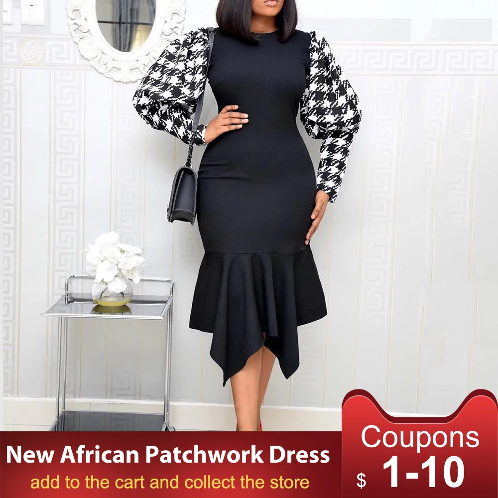 Женское платье с пышными рукавами черное облегающее средней длины