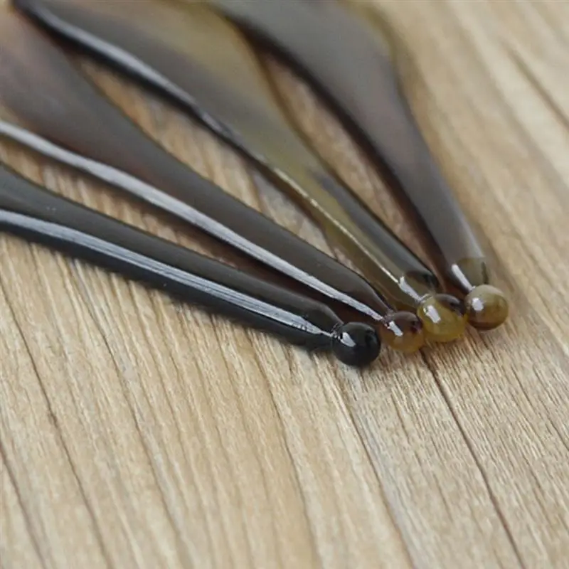 

Massager Plate Multifunctional Yak Horn Scrapping Massager Plates Massager Plates Natural Handicraft Massager (Random Color )