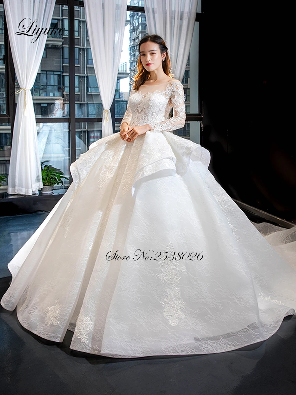 

Liyuke 2020 Ball Gown Wedding Dress Ivory Color With Puffy Pleat Skirt Chapel Train Bridal Dress Full Sleeve