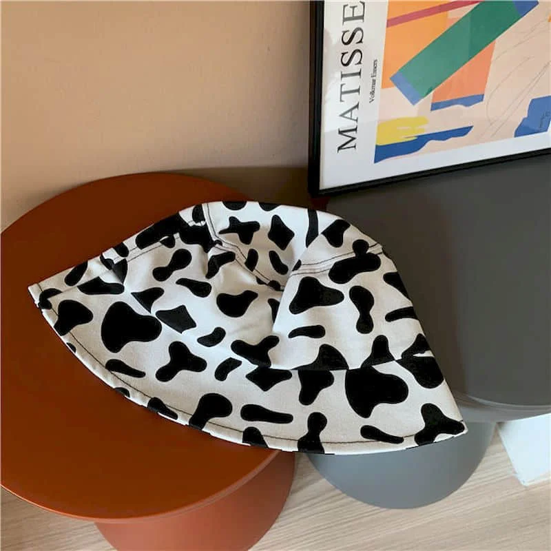 Japanese niche cow pattern fisherman hat tide Korean version of personality fashion face small basin hat female ins net red hat