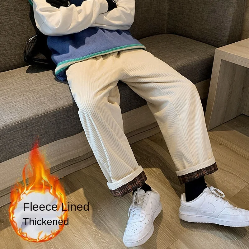 Женские брюки зимние однотонные вельветовые плотные повседневные широкие в