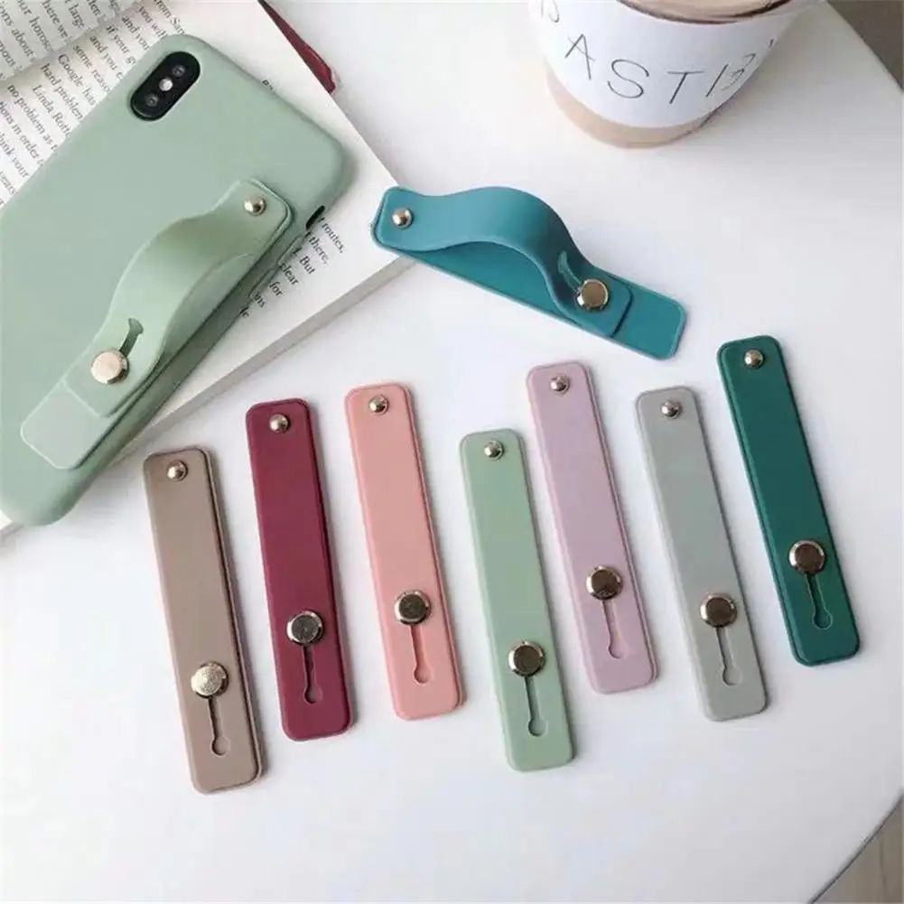 

Candy Solid Color Silicone Wristband Finger Ring Grip Mobile Phone Holder Paste Hand Strap Push-Pull Holder Phone Socket Holder