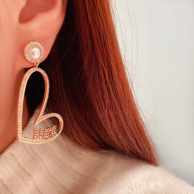 

Love earrings female exaggerated temperament online celebrity long European and American atmosphere personality