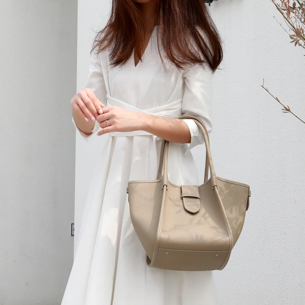 

ＭANSURSTUDIOS 2021 trapeze bag matching braided genuine leather Shoulder basket bag real leather bucket bag