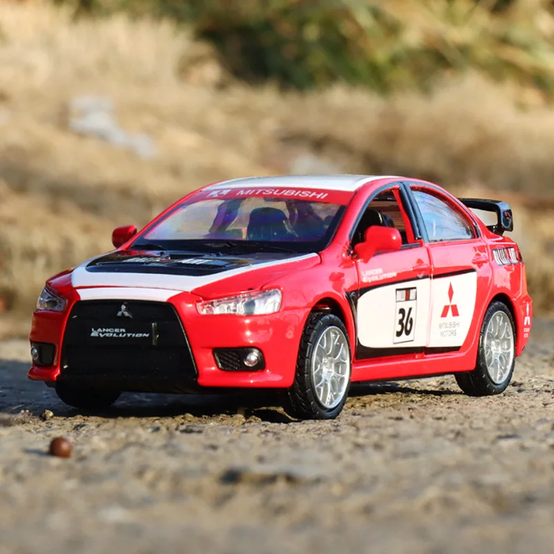Модель автомобиля для коллекции MITSUBISHI EVO масштаба 1:32 из металла с подвижной задней тягой, звуком и светом.