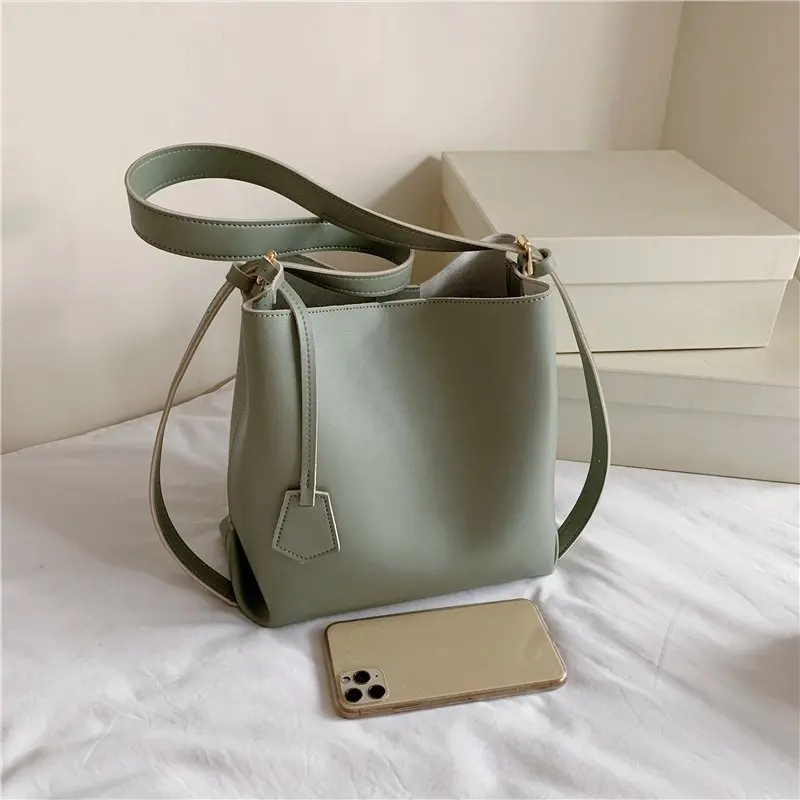 

2021 new Korean literature and art versatile bucket bag texture foreign women's bag forest simple one Shoulder Messenger Bag