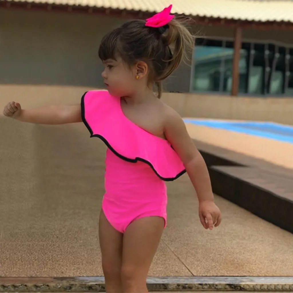 Купальный костюм для маленьких девочек однотонный купальный с оборками летний