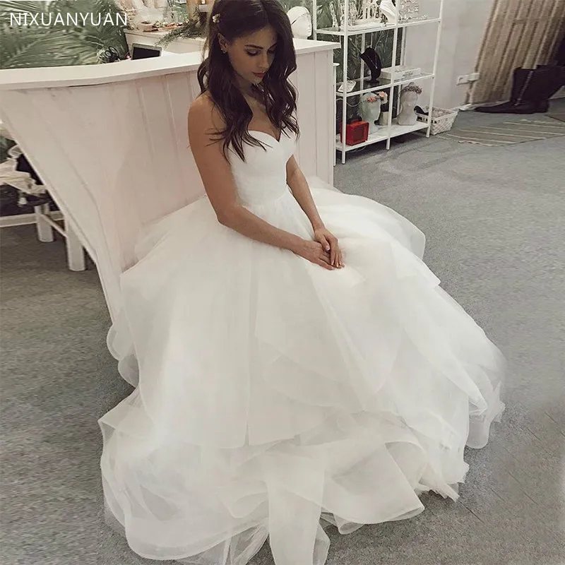 

Full Length Wedding Dress Sweetheart White Ivory Pleat Tulle Bridal Dress Spaghetti Strap Tiered Skirt Backless Vestido De Noiva